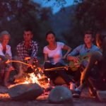 group of campers around a campfire enjoying the peace and tranquility of camping at Beaver Springs Campground in Piedmont MO